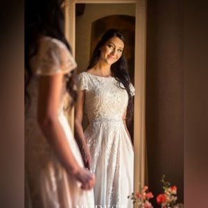 Mon Cheri wedding dress. Never worn before, size 4